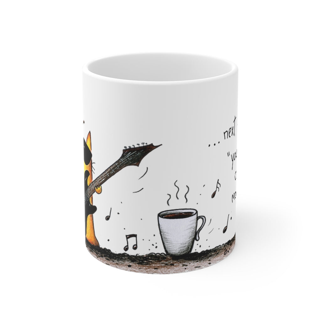 white ceramic mug with cat print