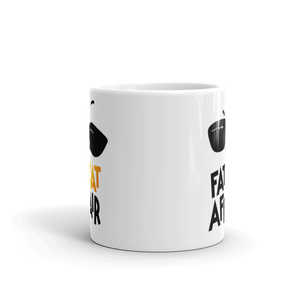 White ceramic mug with cat print